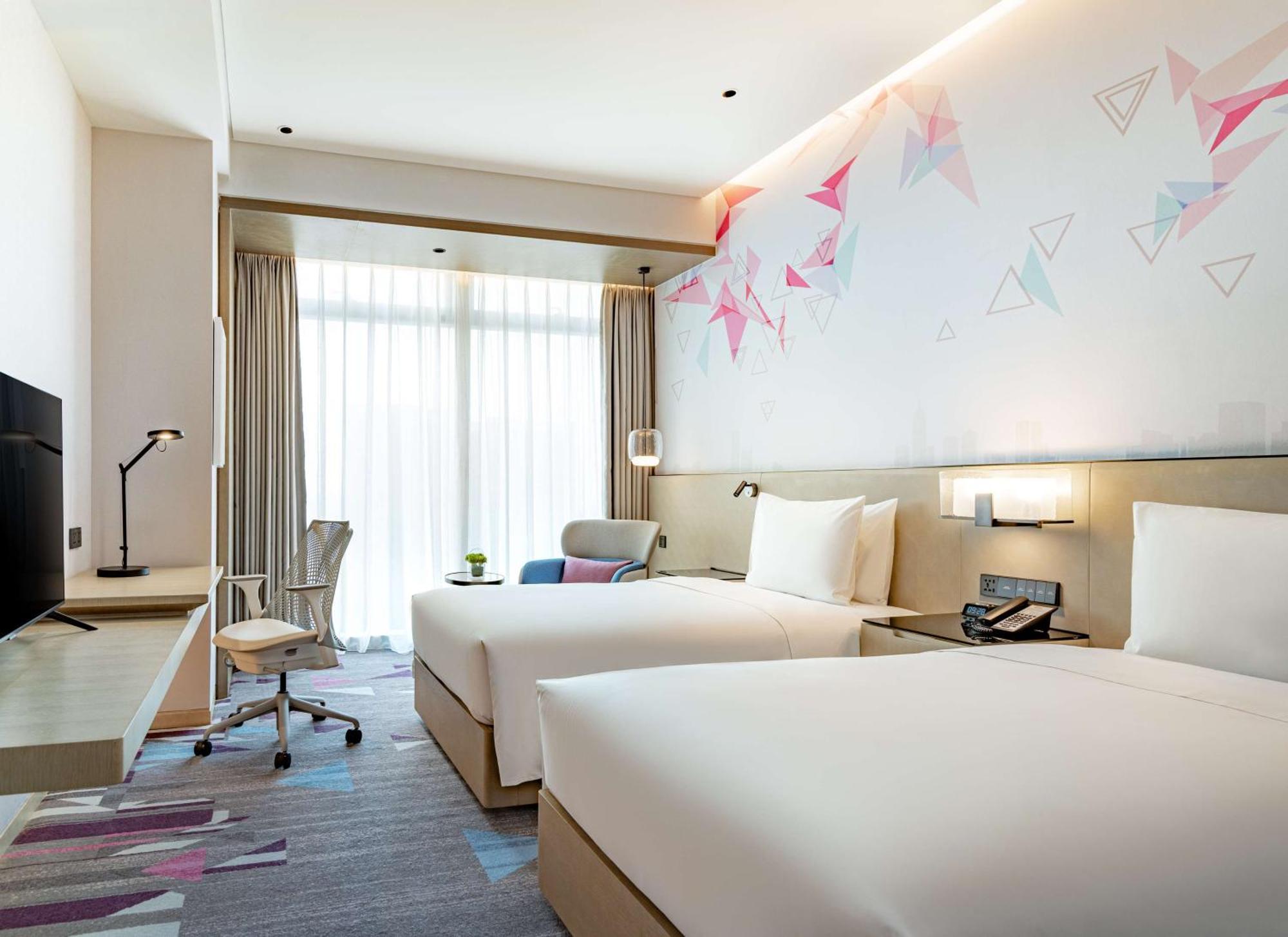 Hilton Garden Inn Shenzhen World Exhibition & Convention Center Esterno foto